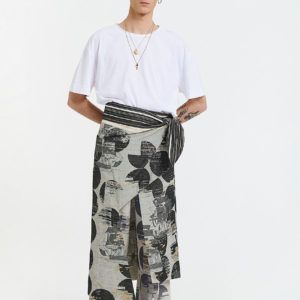 Pareo skirt in black agamemnon pattern, envelope wrapping fastened with inside buttons and knot
