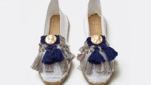 White espadrilles with tassels and metal coins