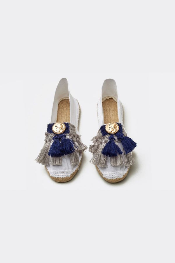 White espadrilles with tassels and metal coins