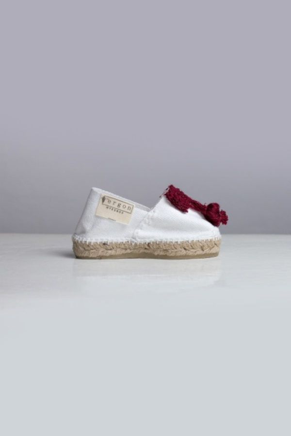 White espadrilles with tassels